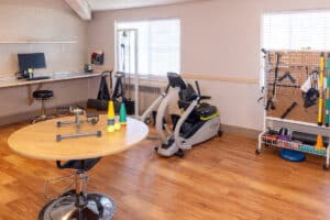 Rehab gym with bikes and OT tools at Eagle Ridge Post Acute